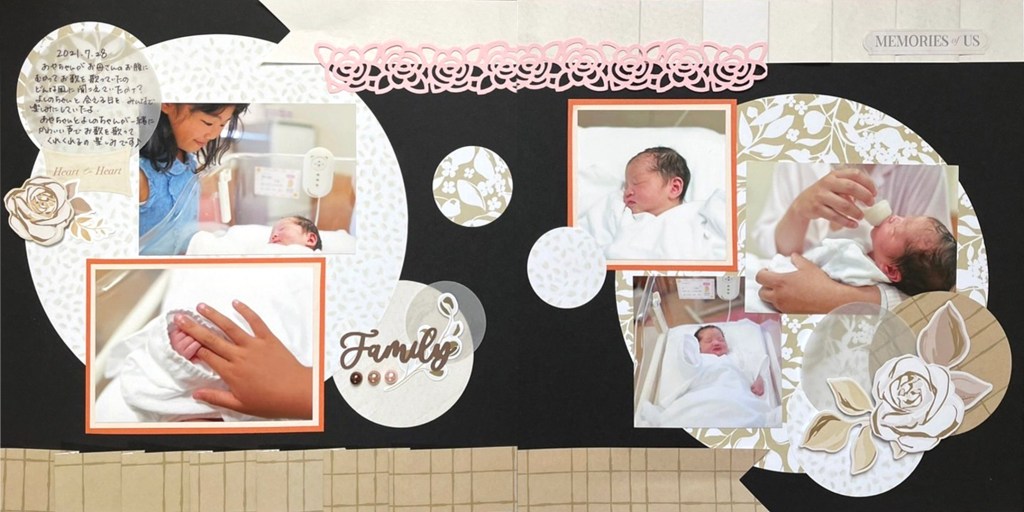 Two-page baby-themed layout.