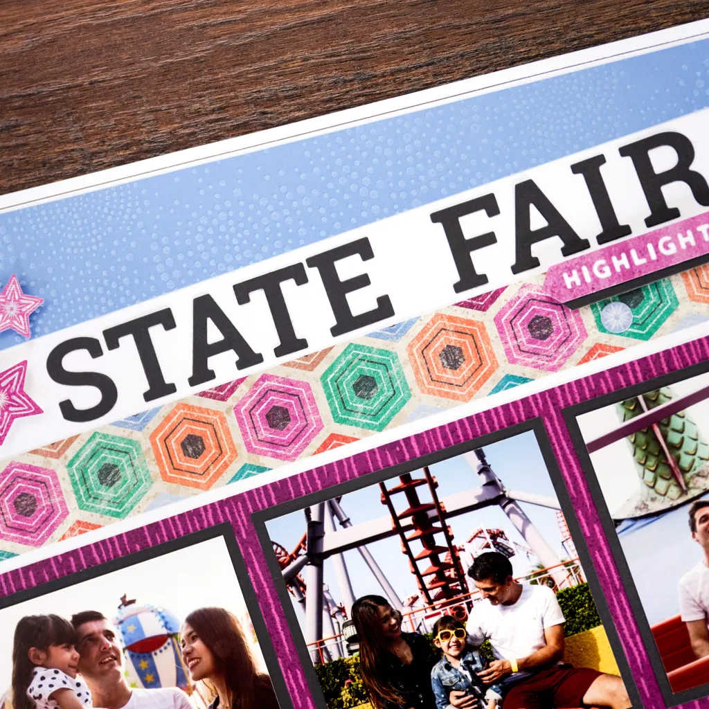 A colorful collage titled 'STATE FAIR' featuring hexagon patterns and family photos, set against a wooden background.